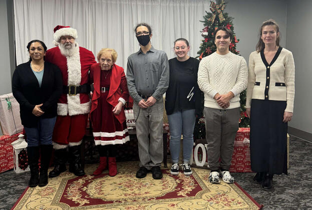 Theta Chi members volunteering for the Sensory Santa event at Autism Pensacola